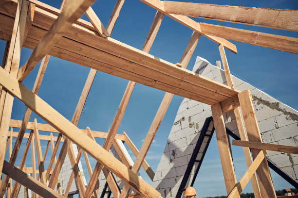 istock Focused photo on beams making frame for future roof 1283768434