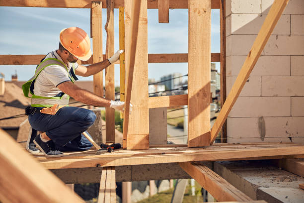 istock Serious worker measuring distance before fastening screws 1283768436