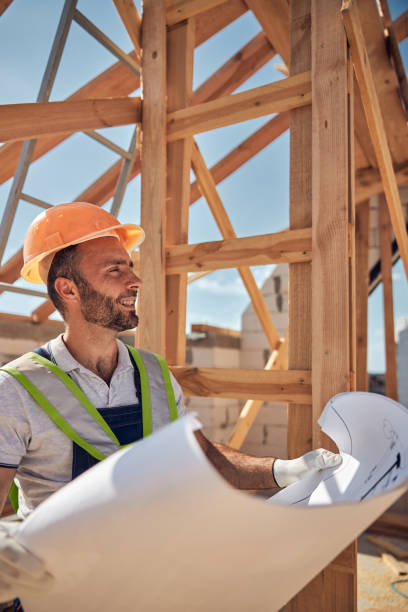 istock Cheerful bearded man holding drawing in both hands 1283768450