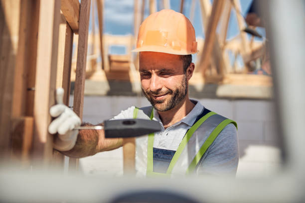 istock Portrait of joyful man that working on the building 1283768456