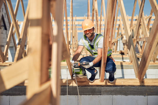 istock Positive delighted young foreman helping his colleagues at work 1283768509