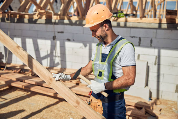 istock Cheerful young man working as foreman on the building 1283768523