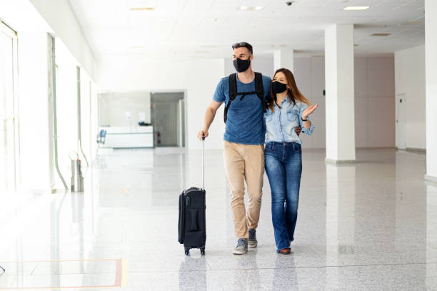 istock Young couple at the Airport 1283768528
