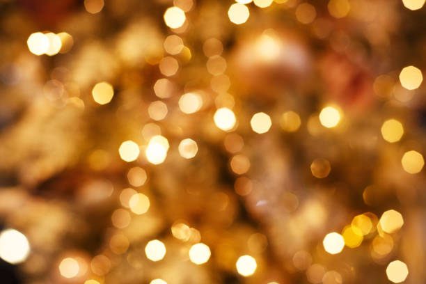 istock beautiful festive Golden bokeh as Wallpaper, soft focus 1283769348