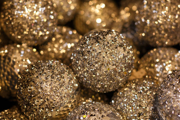 istock Golden shiny balls for Christmas tree close-up beautiful background , soft focus 1283769352