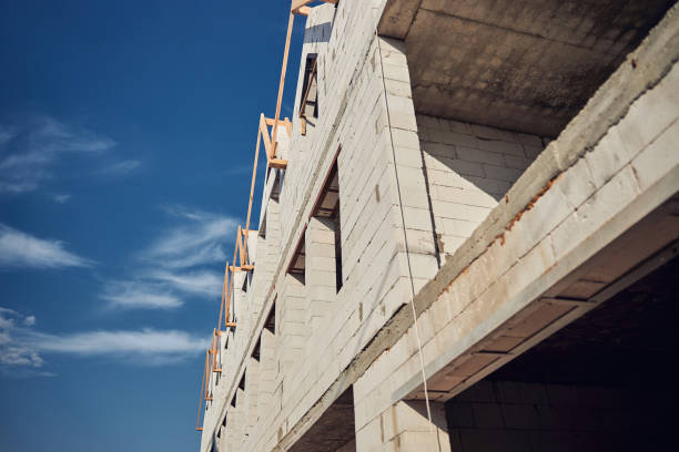 istock New building made of white bricks in the making 1283773576