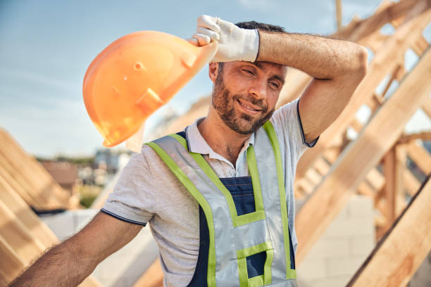 istock Tired hard-working man rubbing his forehead and resting 1283773601