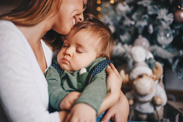 istock Sister is cuddeling with his baby brother. 1283773623