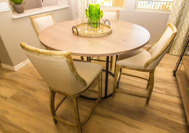 istock Dining Area With Round Wooden Table & Four Chairs 1283774501
