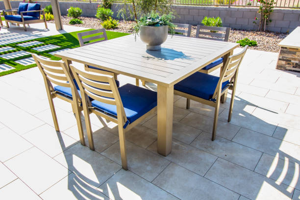 istock Rear Yard Patio With Square Table, Six Chairs & Centerpiece 1283774548