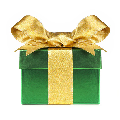Green gift box wrapped with shiny gold bow and ribbon isolated on a white background