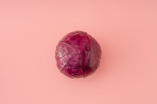 Red Cabbage on pink background
