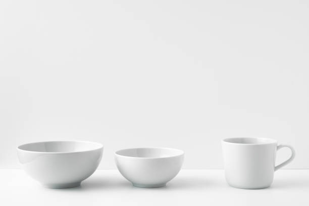 istock Three circles stand on a white surface against a white background. Copy space, mock up. 1283777718