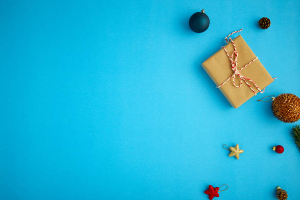 istock Different Christmas decorations and toys on blue background 1283782128