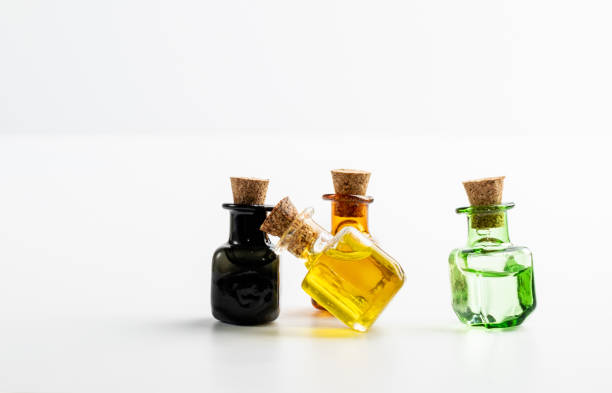 istock Essential Oil, Tincture or Extract Mockup with Small Bottles 1283783231