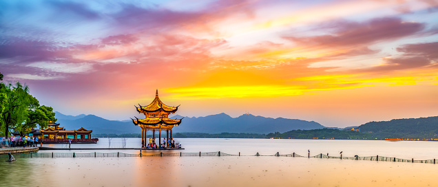 Chinese garden landscape and sunset in Hangzhou West Lake
