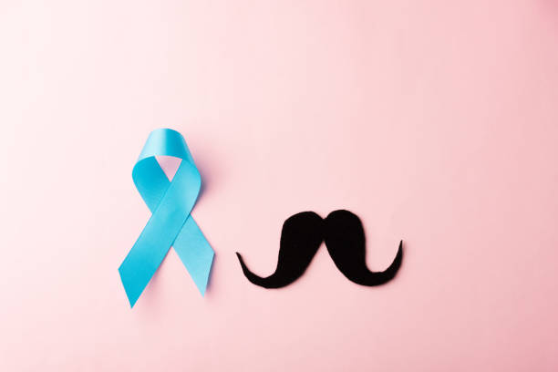 istock Black mustache paper and light blue ribbon 1283795883
