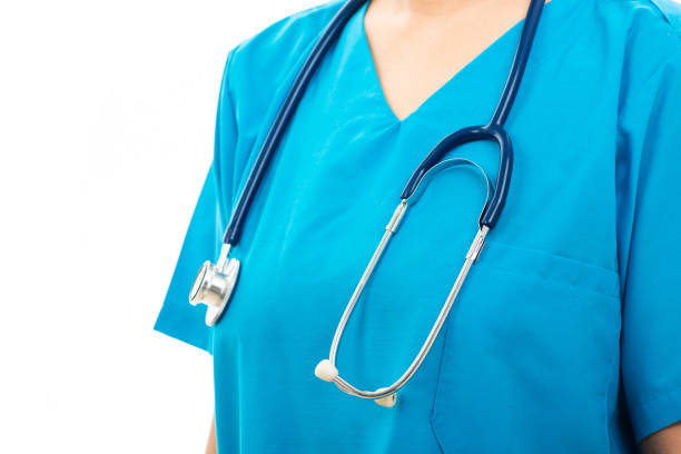 istock female nurse standing with stethoscope 1283795901