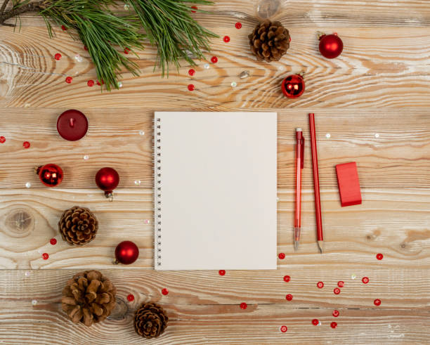 istock Christmas Decorations Mockup on Wood Table Top View 1283796763