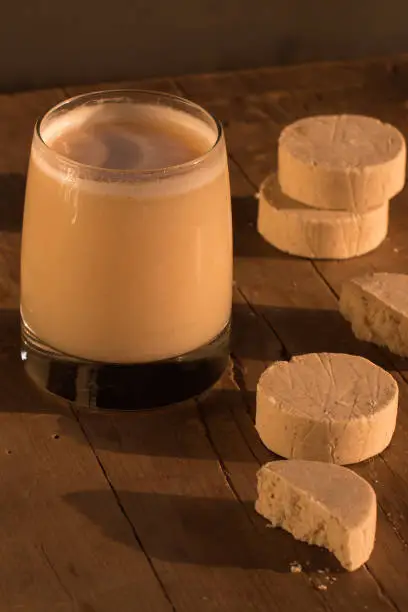 Photo of Glass of marzipan cured pulque