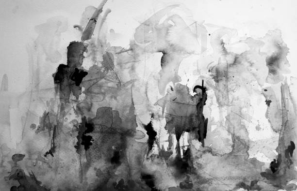 istock Black and white abstract messy hand colored watercolor with splashes 1283803704