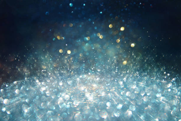 istock background of abstract glitter lights. silver, blue and black. de focused 1283806456