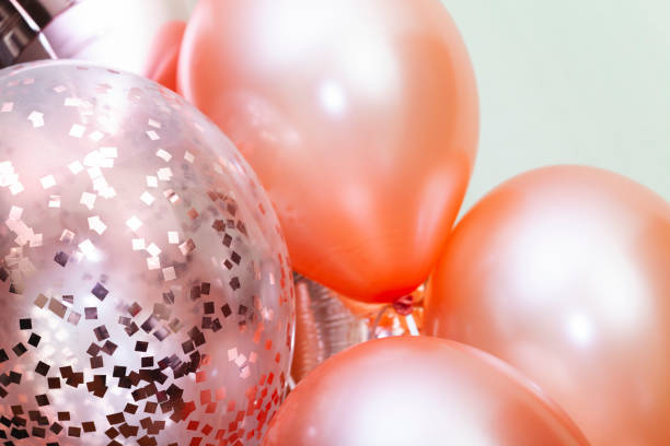 istock Shiny colorful balloons. Holiday decoration background 1283809926