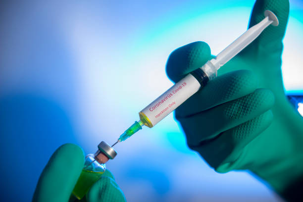 istock Vaccine and syringe injection It use for prevention, immunization and treatment from COVID-19 1283809965