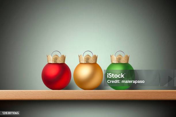 Three Wise Men Three Christmas Balls On The Sheft Stock Photo - Download Image Now