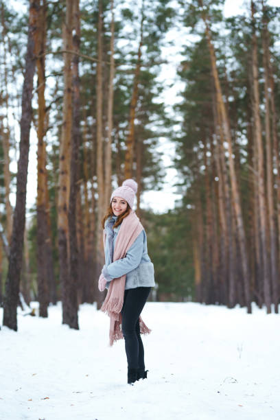istock Young beautiful woman smiling and having fun in the forest. 1283812661