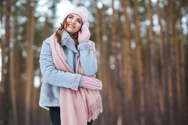 istock Young beautiful woman smiling and having fun in the forest. 1283812668