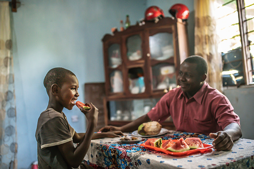 African  family eating healthy food together