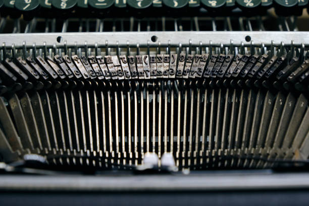 mechanism of typesetting strikers with the english alphabet in an old retro typewriter. - typewriter typebar ampersand retro revival imagens e fotografias de stock