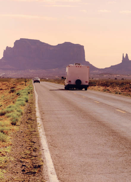 istock Motor Home Driving in Monument Valley. 1283819984