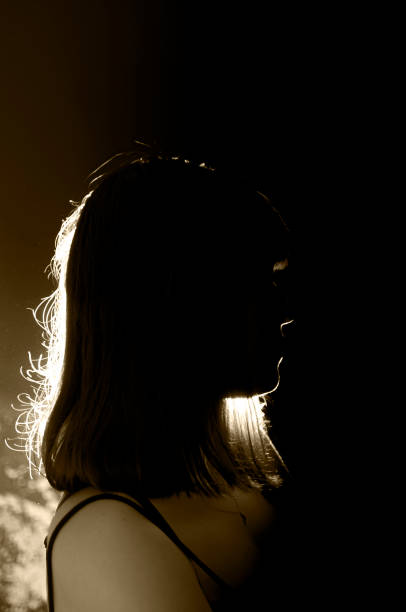 istock Teenager portrait with back light 1283820844