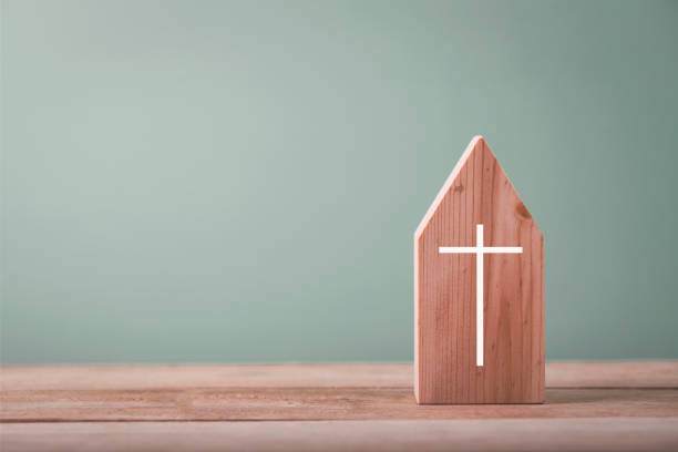 Small house church for catholics , community of Christ , Concept of hope , christianity , faith, religion and church online. stock photo