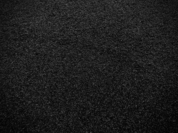 istock Black sand texture background. Black Friday background concept. 1283821634