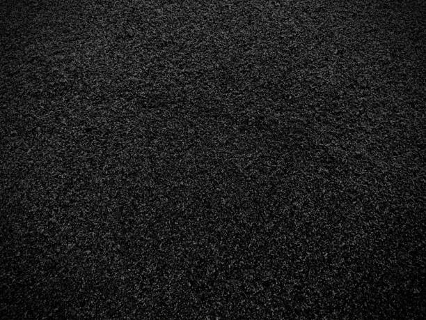 Black sand texture background. Black Friday background concept. Black sand texture background. Black Friday background concept. black sand stock pictures, royalty-free photos & images