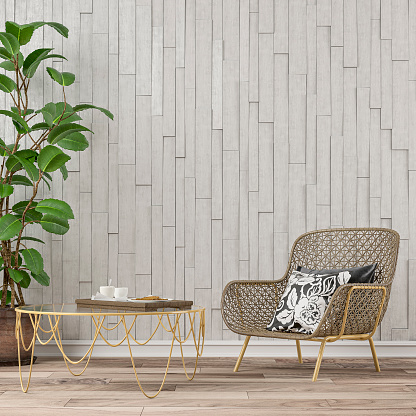 Empty retro interior with rattan chair, low table and potted plant in front of a white stone tiled wall background on hardwood floor with copy space. Slight vintage effect added. 3D rendered image.