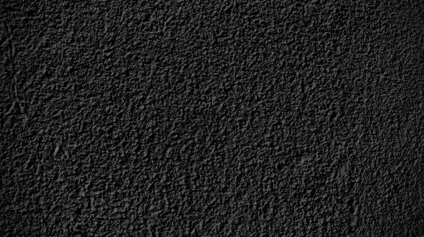 istock Black sand texture background. Black Friday background concept. 1283821727