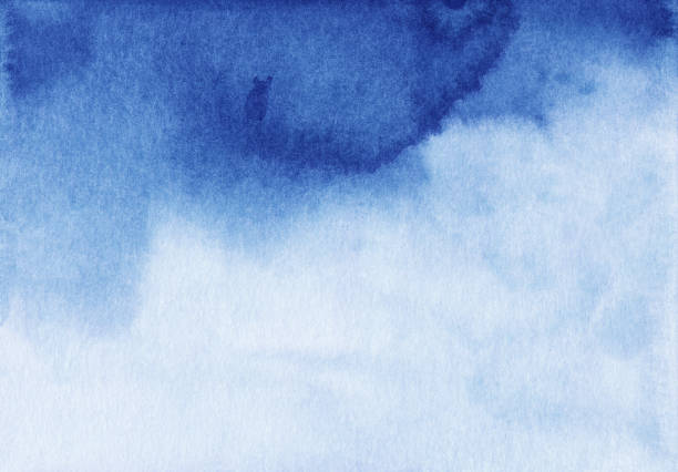istock Watercolor old ocean blue and white gradient background. Stains on paper. 1283824208