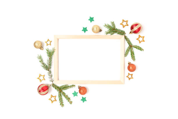 istock Wooden frame with Christmas decorations on a white background. 1283824468