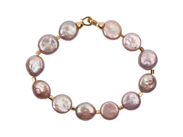 istock Purple baroque pearl bracelet on white background 1283826748