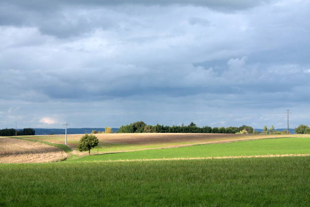 istock MEADOWS AND FIELDS LOT AND GARONNE THREATENING SKY 1283827965