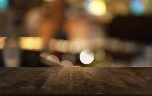 istock Wood Table Top in Blur Background room interior with empty copy space. 1283828169