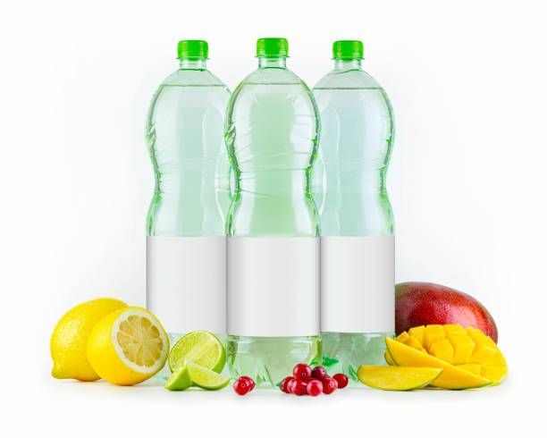 istock Large plastic bottles with water, different fruits in foreground, isolated on white background 1283829112