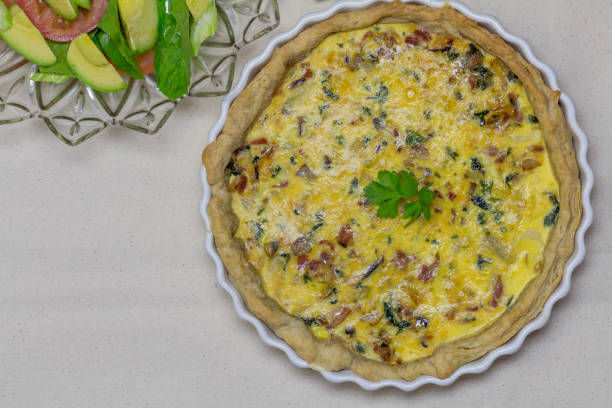 istock Savoury tart and salad on the side, top view 1283833011