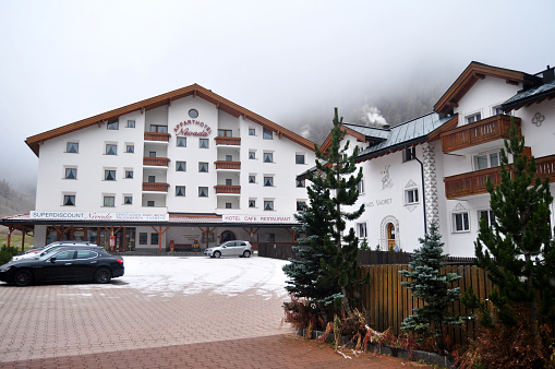 Classic building resort hotel for Swiss and foreign travel visit rest relax on alps mountain in Tschlin Ramosch village on alps at Samnaun or Samignun valley winter season on November 5, 2016 in Graubunden, Switzerland
