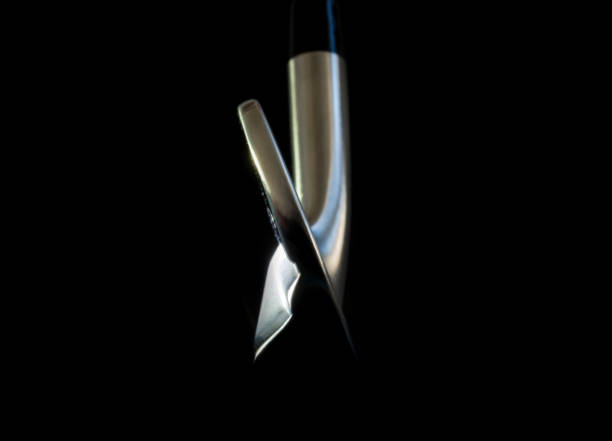 istock Golf Club Iron on Black Background 1283836323