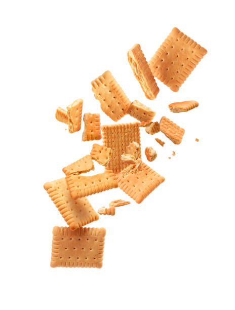 istock Cookies are broken into pieces with falling crumbs down 1283836575